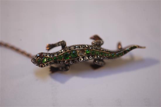 A late Victorian gold and silver, demantoid garnet and rose cut diamond set lizard brooch, 40mm.